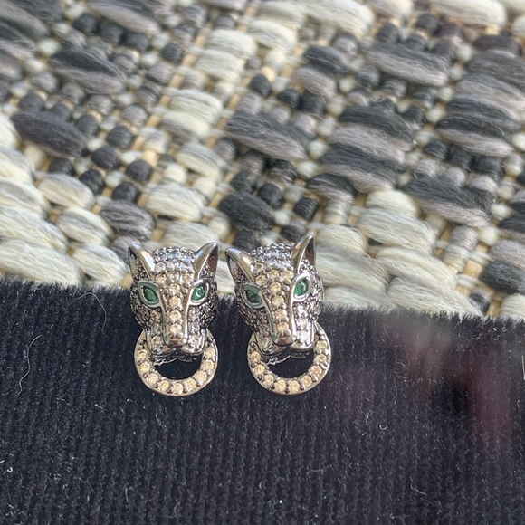gold puma earrings